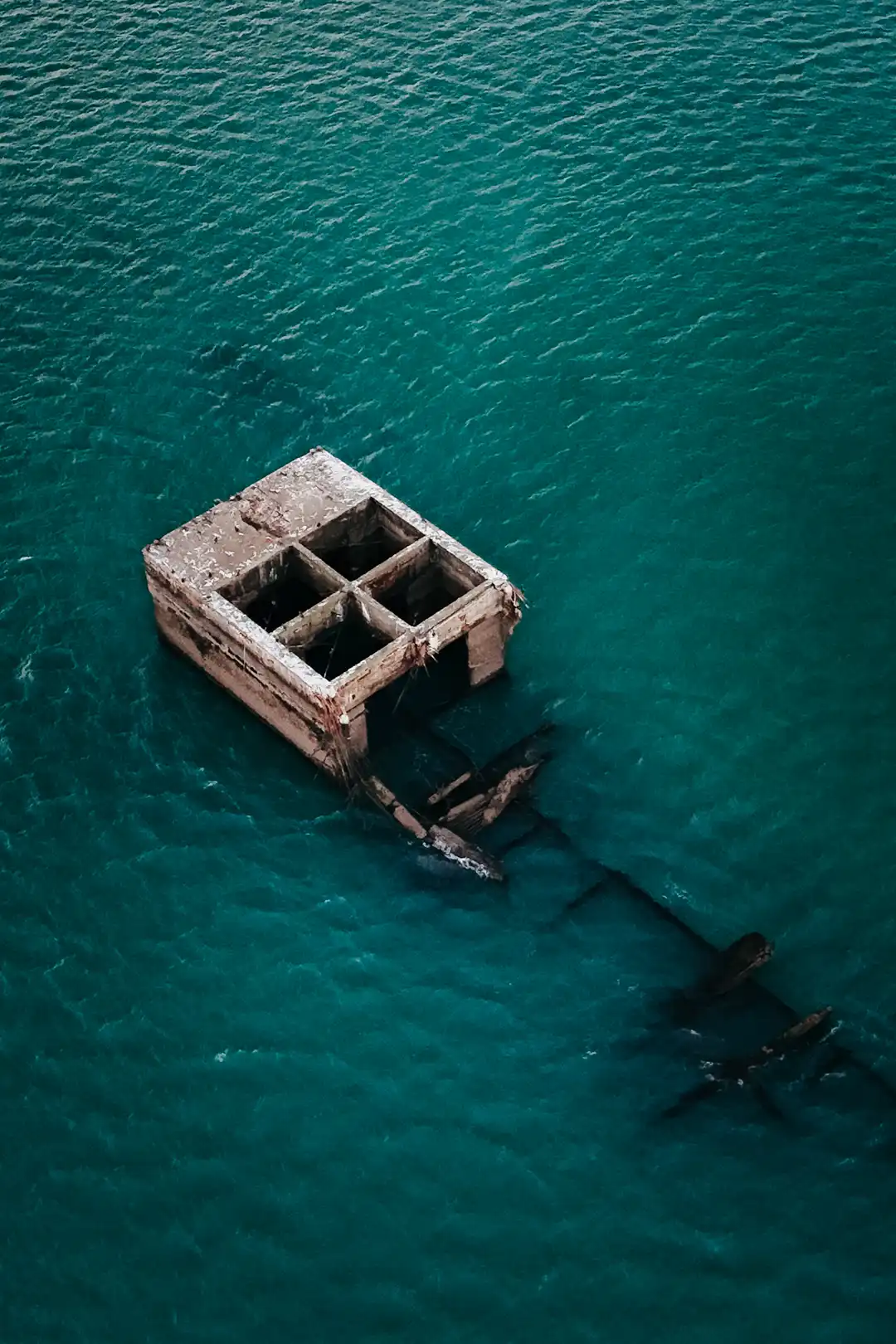 Vestiges of the artificial port of Arromanches in Normandy